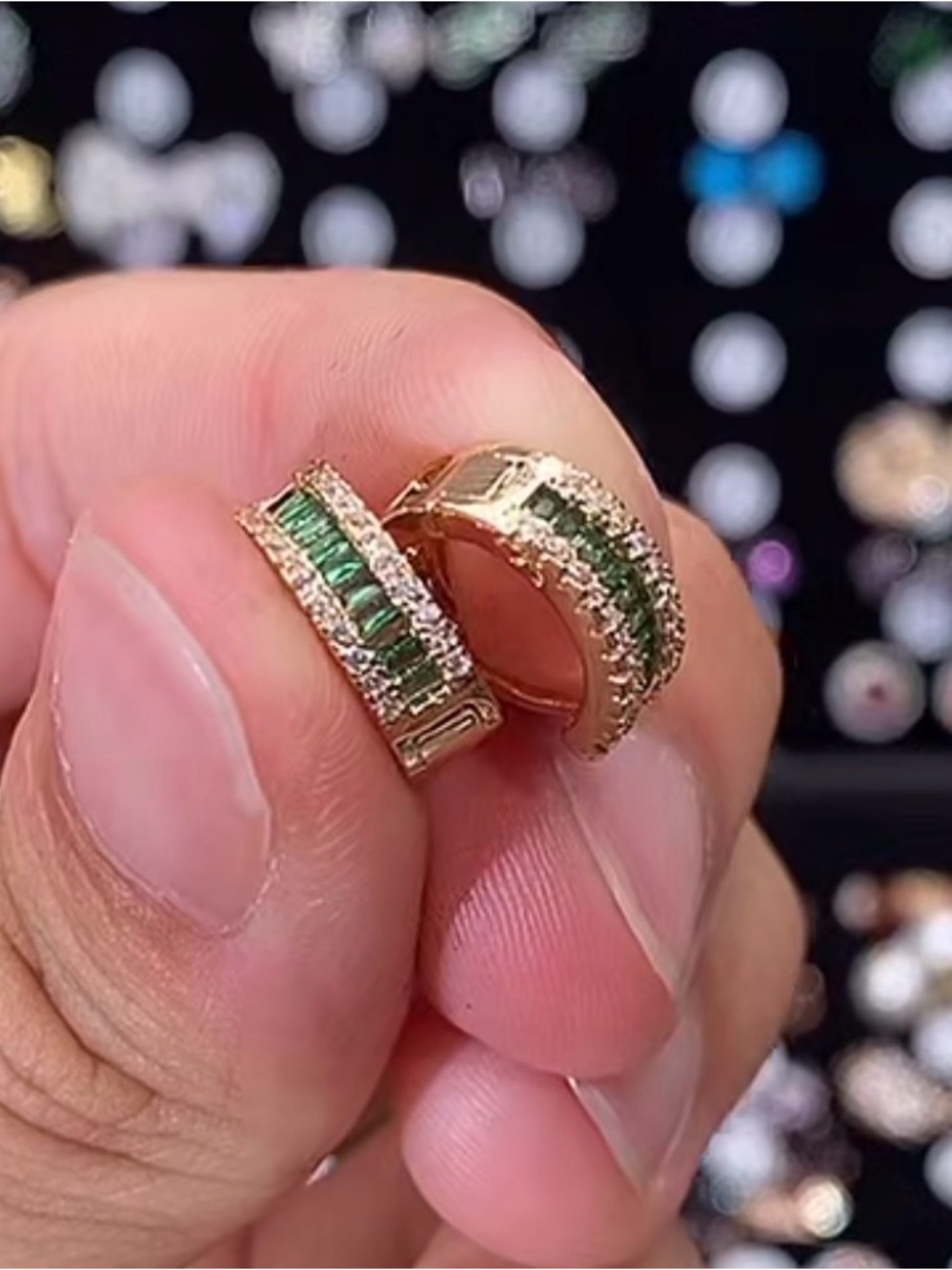 Gold Huggie Earrings with Green Gem Accents